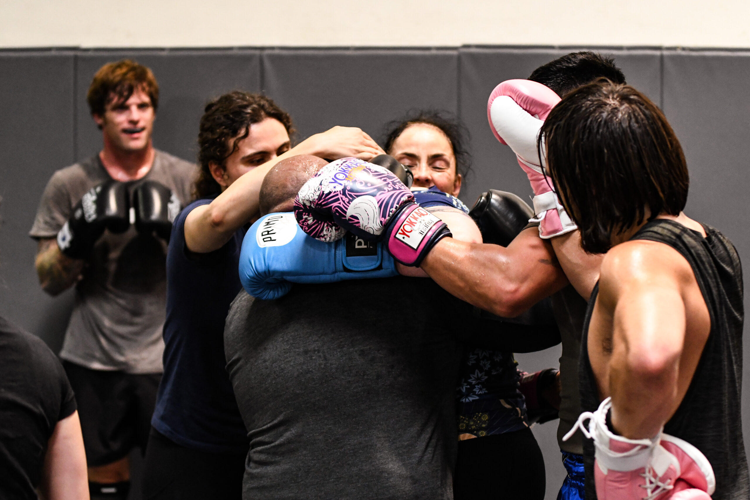 Alliance members practicing together with boxing gloves